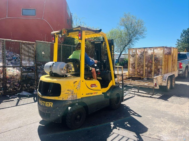 a forklift being used in the parking lot for bring your trailer in yourself a forklift being used in the parking lot for bring your trailer in yourself